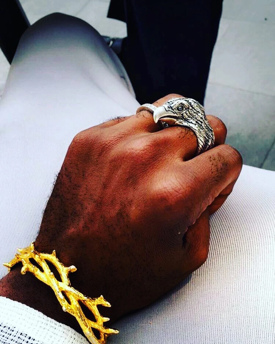Ugo Mozie wearing the Eagle Ring he created with Frank Wilder
