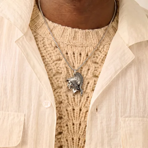Micro Totem worn on a silver chain